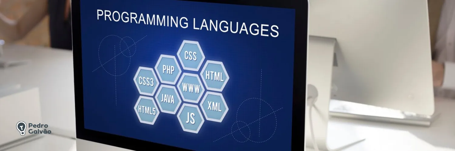 Computador com texto na tela "programming languages" para indicar vocabulário em inglês na área de tecnologia